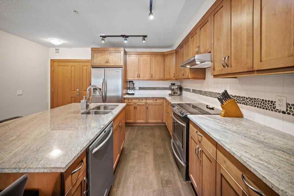 MLS® A2221320 - Unit #111 106 Stewart Creek Landing  in Three Sisters Canmore, Residential