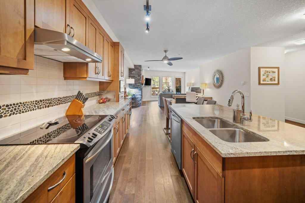 MLS® A2221320 - Unit #111 106 Stewart Creek Landing  in Three Sisters Canmore, Residential