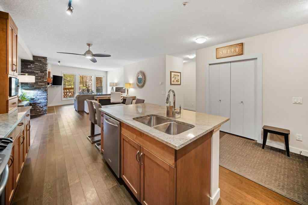 MLS® A2221320 - Unit #111 106 Stewart Creek Landing  in Three Sisters Canmore, Residential