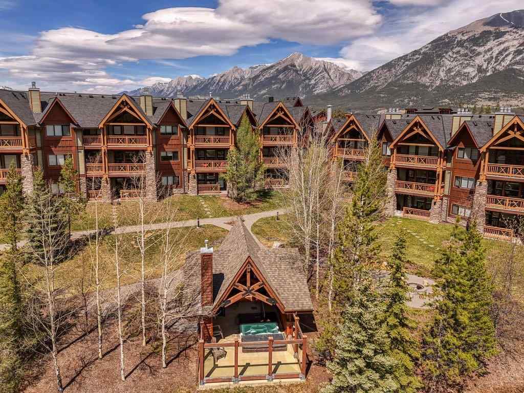 MLS® A2221320 - Unit #111 106 Stewart Creek Landing  in Three Sisters Canmore, Residential