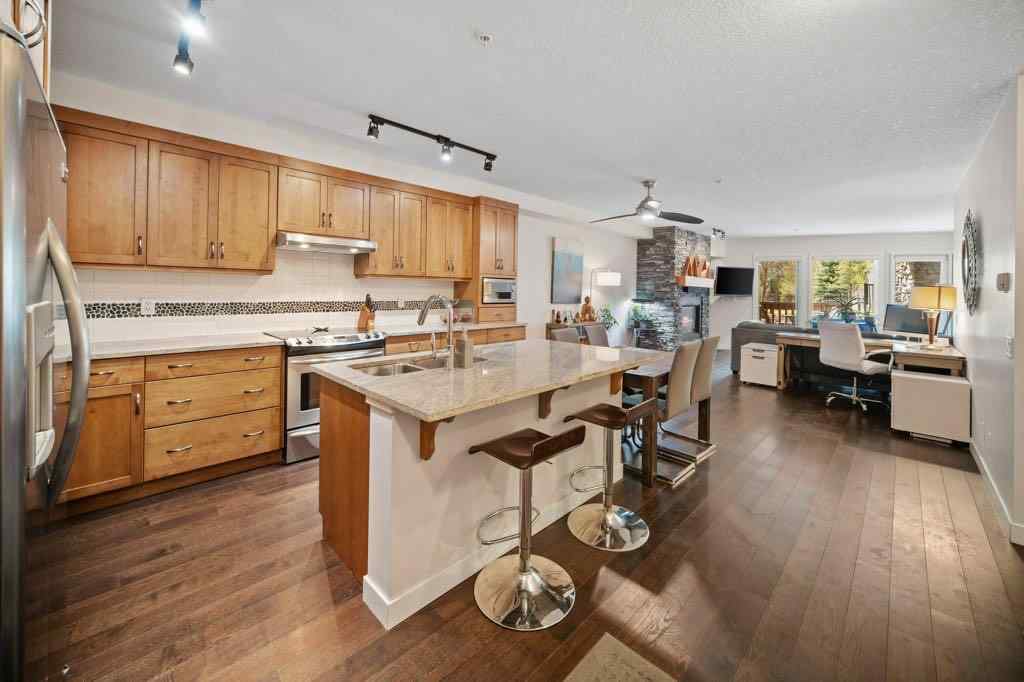 MLS® A2221320 - Unit #111 106 Stewart Creek Landing  in Three Sisters Canmore, Residential