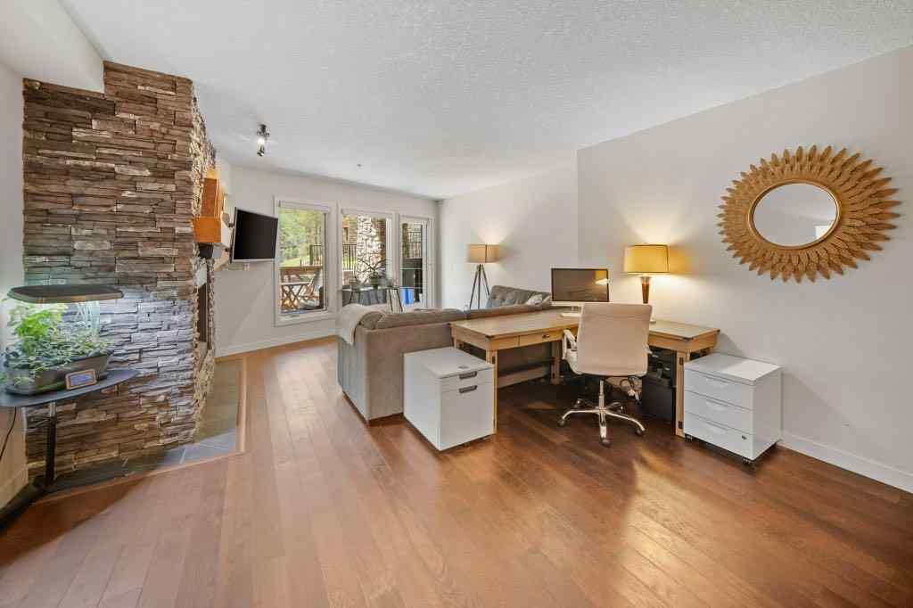 MLS® A2221320 - Unit #111 106 Stewart Creek Landing  in Three Sisters Canmore, Residential