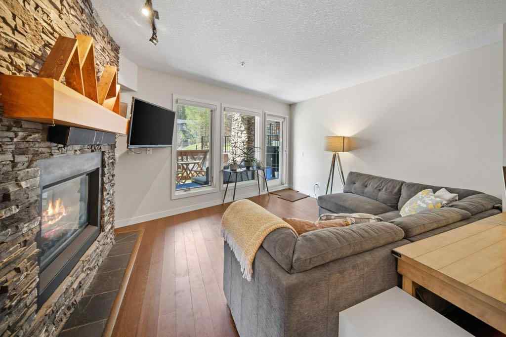 MLS® A2221320 - Unit #111 106 Stewart Creek Landing  in Three Sisters Canmore, Residential