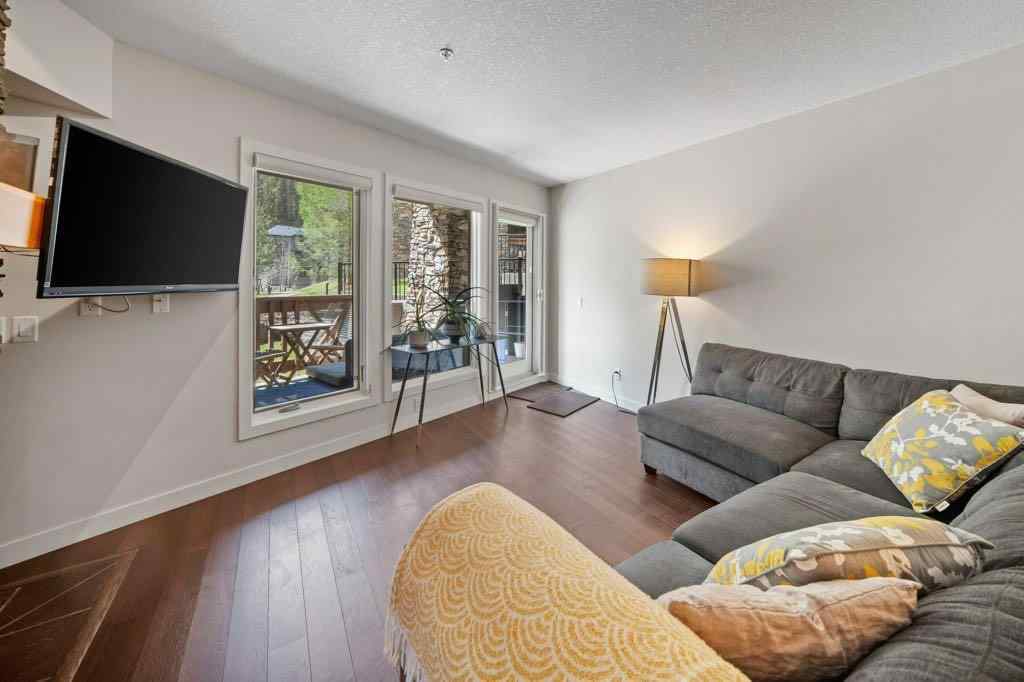 MLS® A2221320 - Unit #111 106 Stewart Creek Landing  in Three Sisters Canmore, Residential