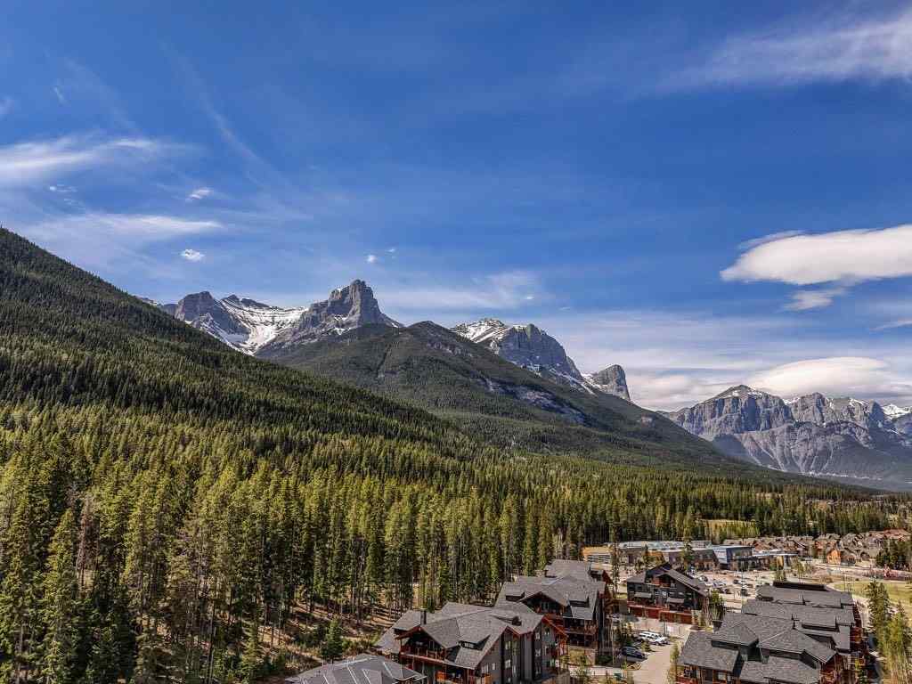 MLS® A2221320 - Unit #111 106 Stewart Creek Landing  in Three Sisters Canmore, Residential