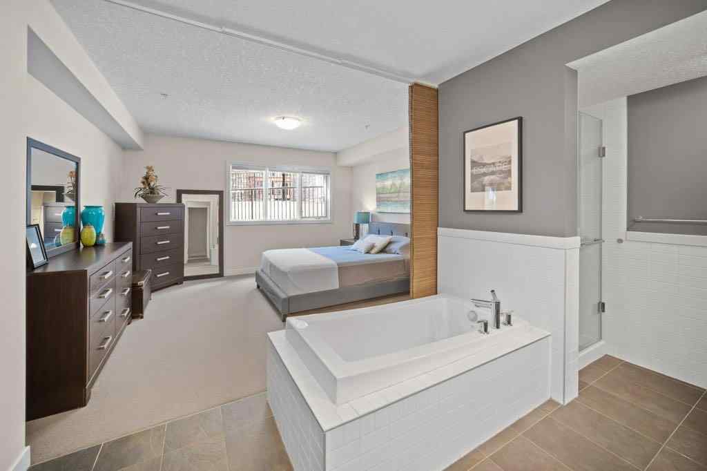 MLS® A2221320 - Unit #111 106 Stewart Creek Landing  in Three Sisters Canmore, Residential