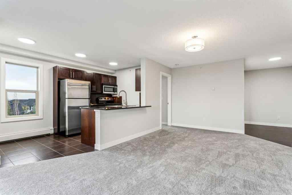 MLS® A2221369 - Unit #427 355 Taralake Way NE in Taradale Calgary, Residential