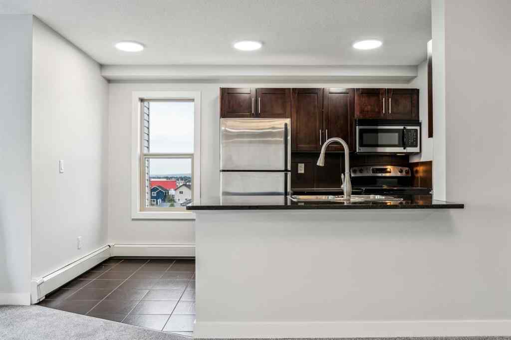 MLS® A2221369 - Unit #427 355 Taralake Way NE in Taradale Calgary, Residential