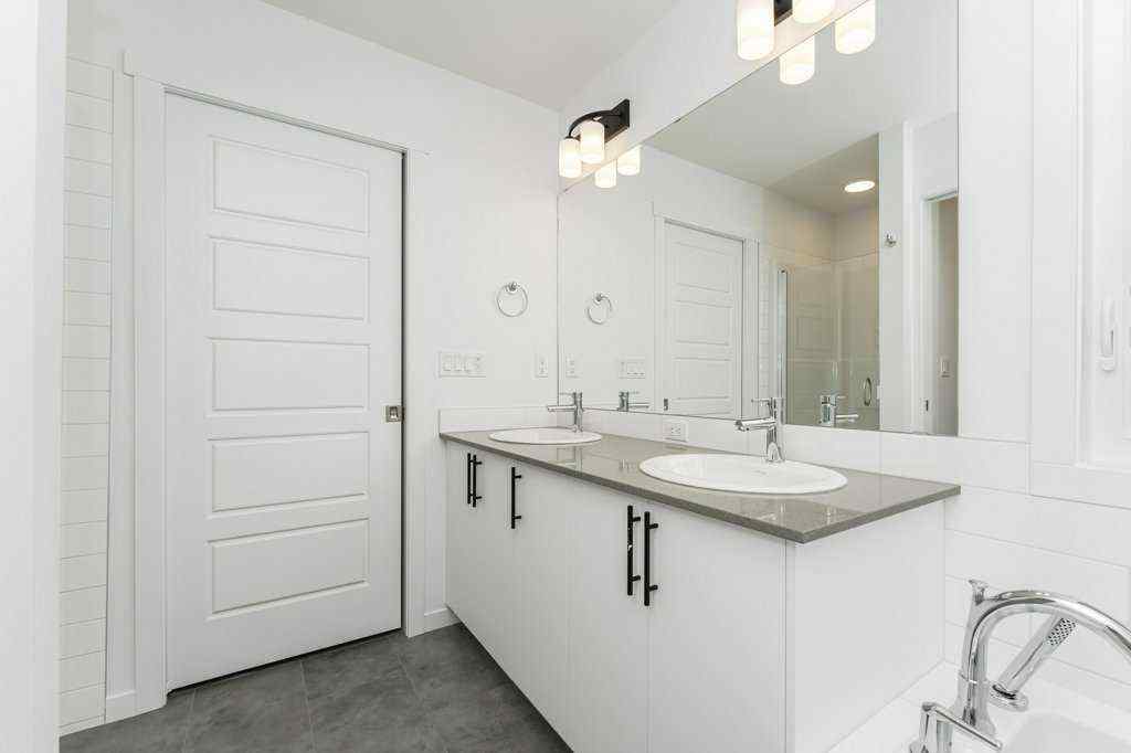 MLS® A2221582 - 68 Creekstone Grove SW in Pine Creek Calgary, Residential