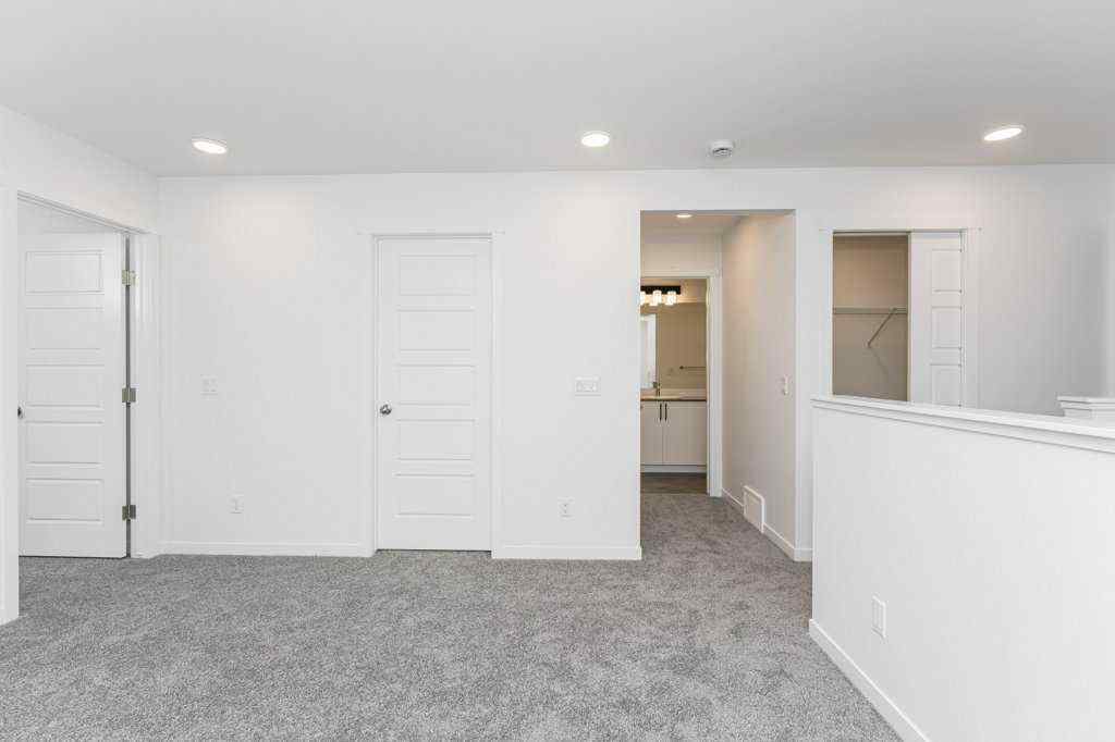 MLS® A2221582 - 68 Creekstone Grove SW in Pine Creek Calgary, Residential