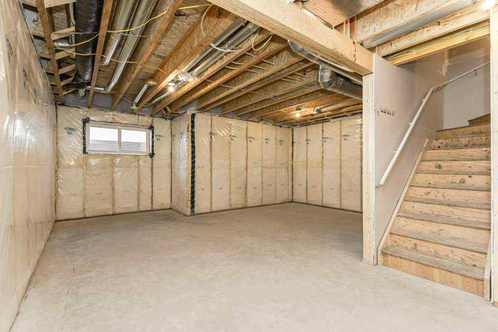 MLS® A2221582 - 68 Creekstone Grove SW in Pine Creek Calgary, Residential