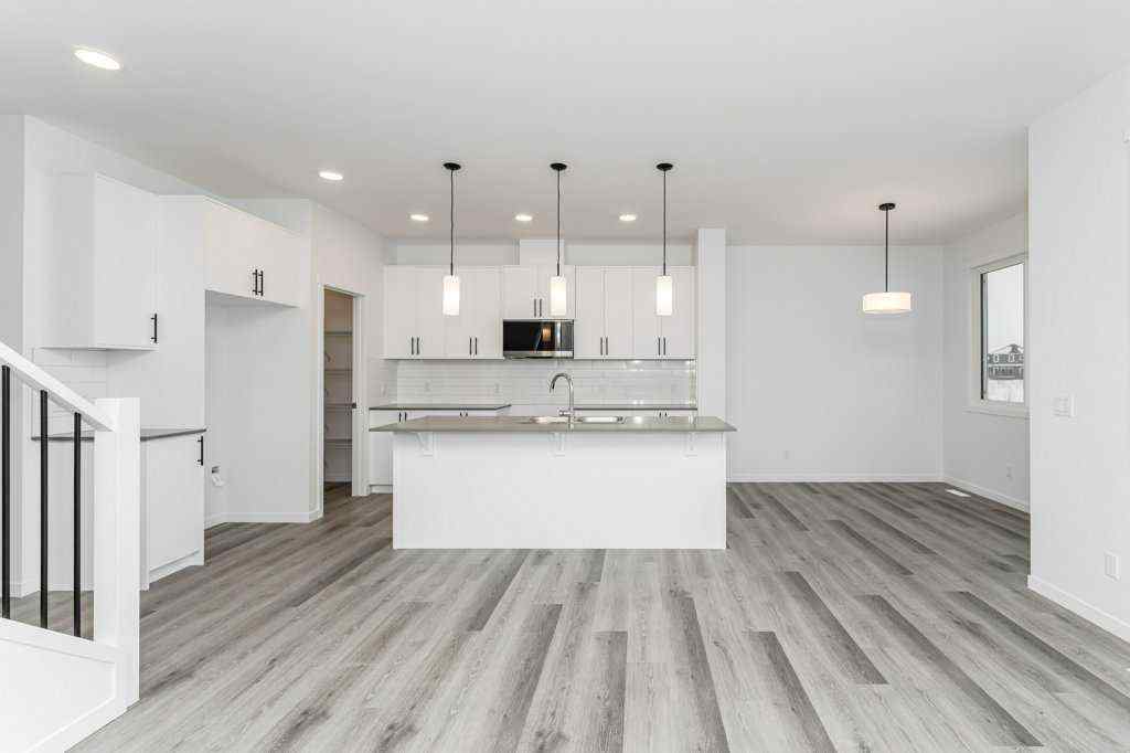 MLS® A2221582 - 68 Creekstone Grove SW in Pine Creek Calgary, Residential