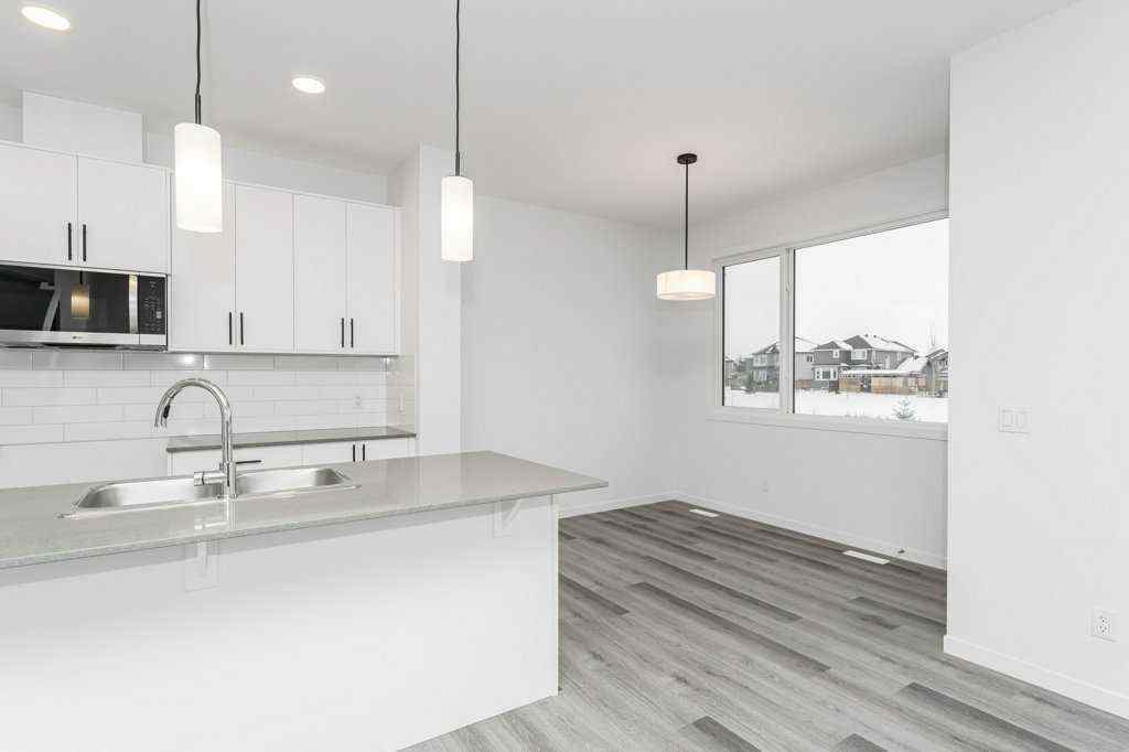 MLS® A2221582 - 68 Creekstone Grove SW in Pine Creek Calgary, Residential