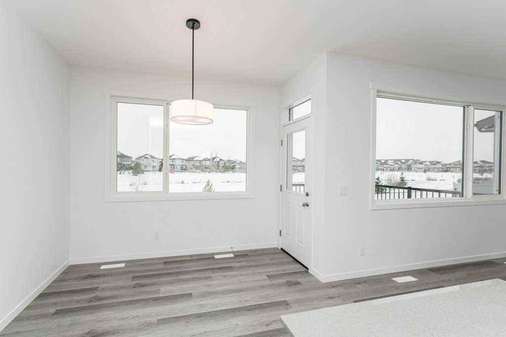 MLS® A2221582 - 68 Creekstone Grove SW in Pine Creek Calgary, Residential