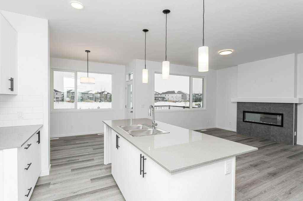 MLS® A2221582 - 68 Creekstone Grove SW in Pine Creek Calgary, Residential