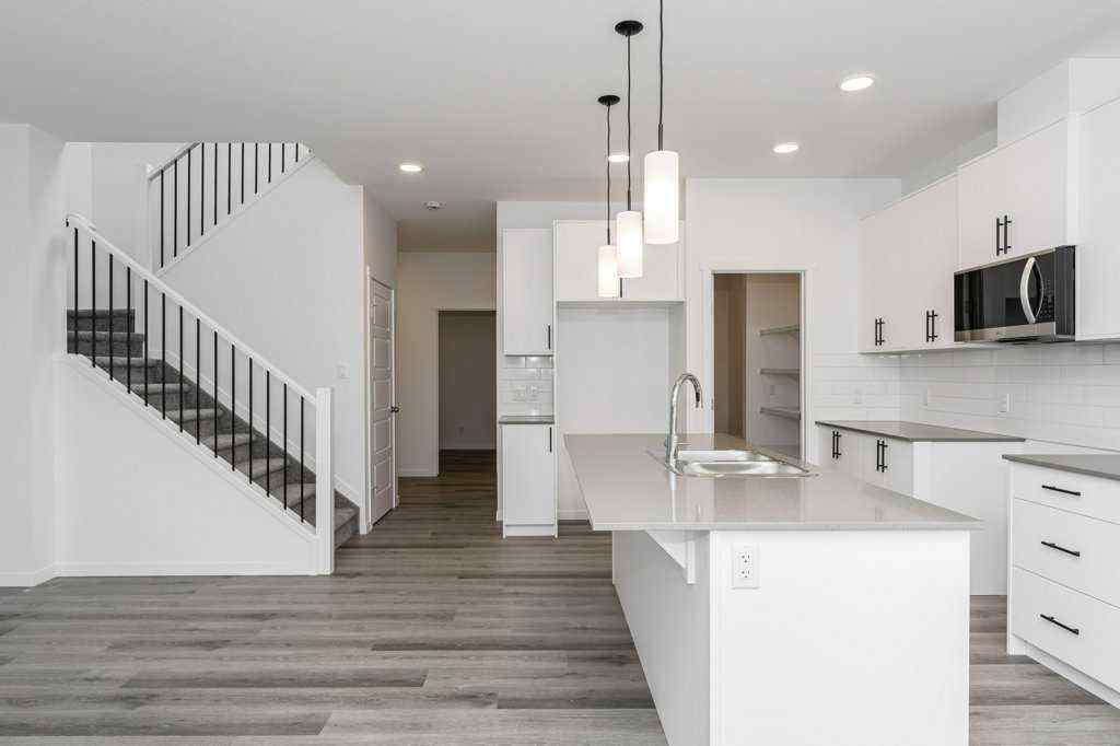MLS® A2221582 - 68 Creekstone Grove SW in Pine Creek Calgary, Residential