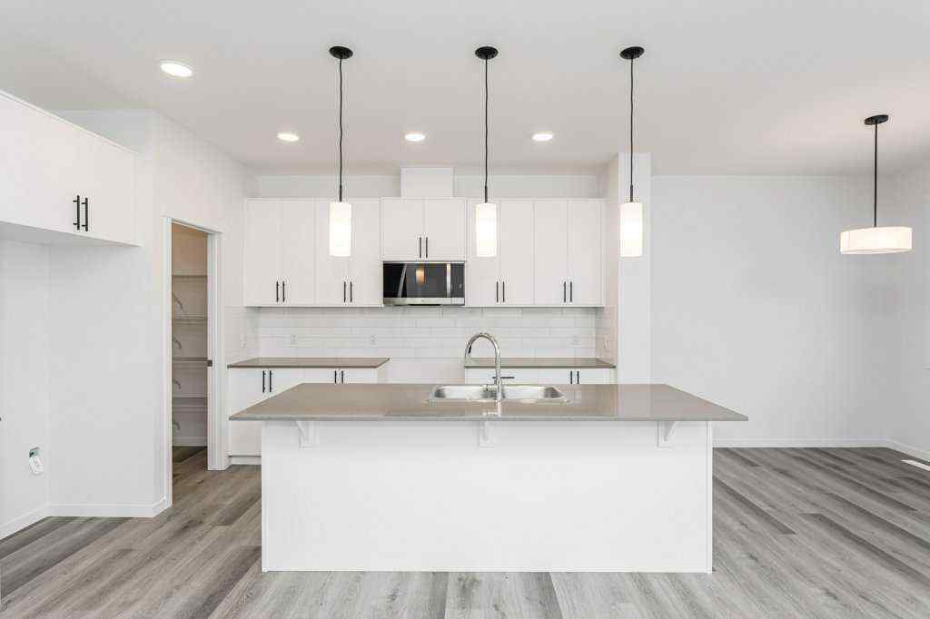 MLS® A2221582 - 68 Creekstone Grove SW in Pine Creek Calgary, Residential