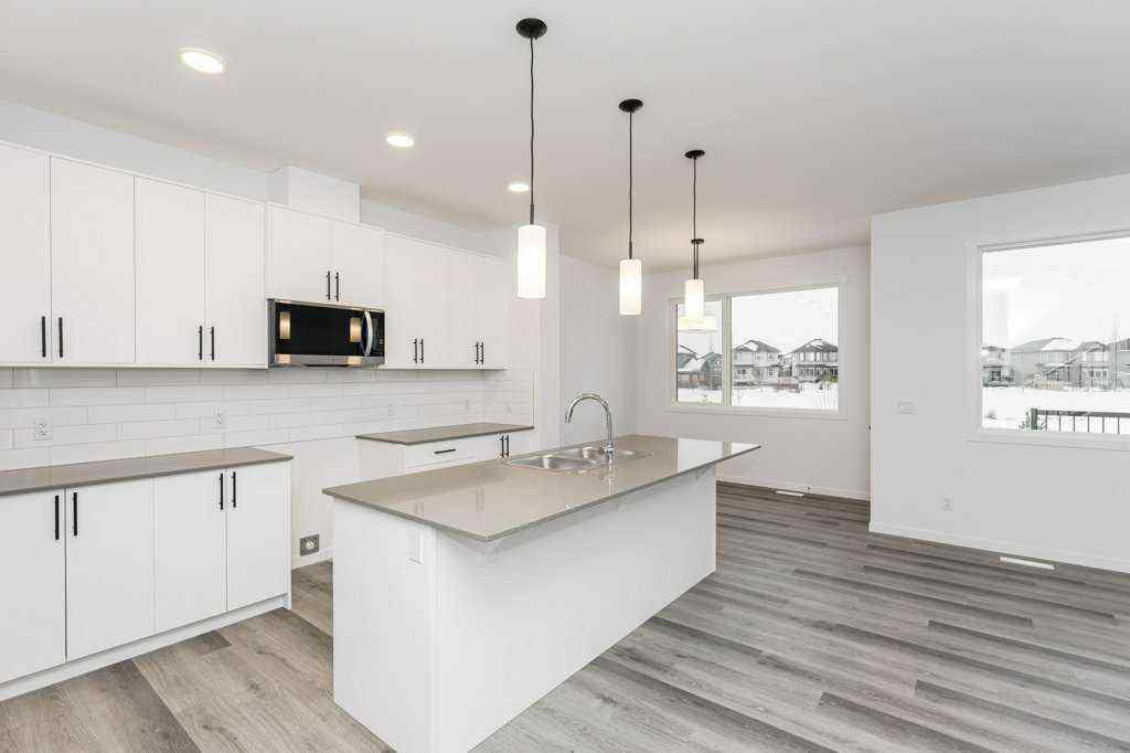MLS® A2221582 - 68 Creekstone Grove SW in Pine Creek Calgary, Residential