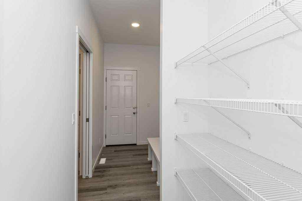 MLS® A2221582 - 68 Creekstone Grove SW in Pine Creek Calgary, Residential
