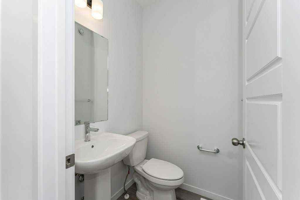 MLS® A2221582 - 68 Creekstone Grove SW in Pine Creek Calgary, Residential