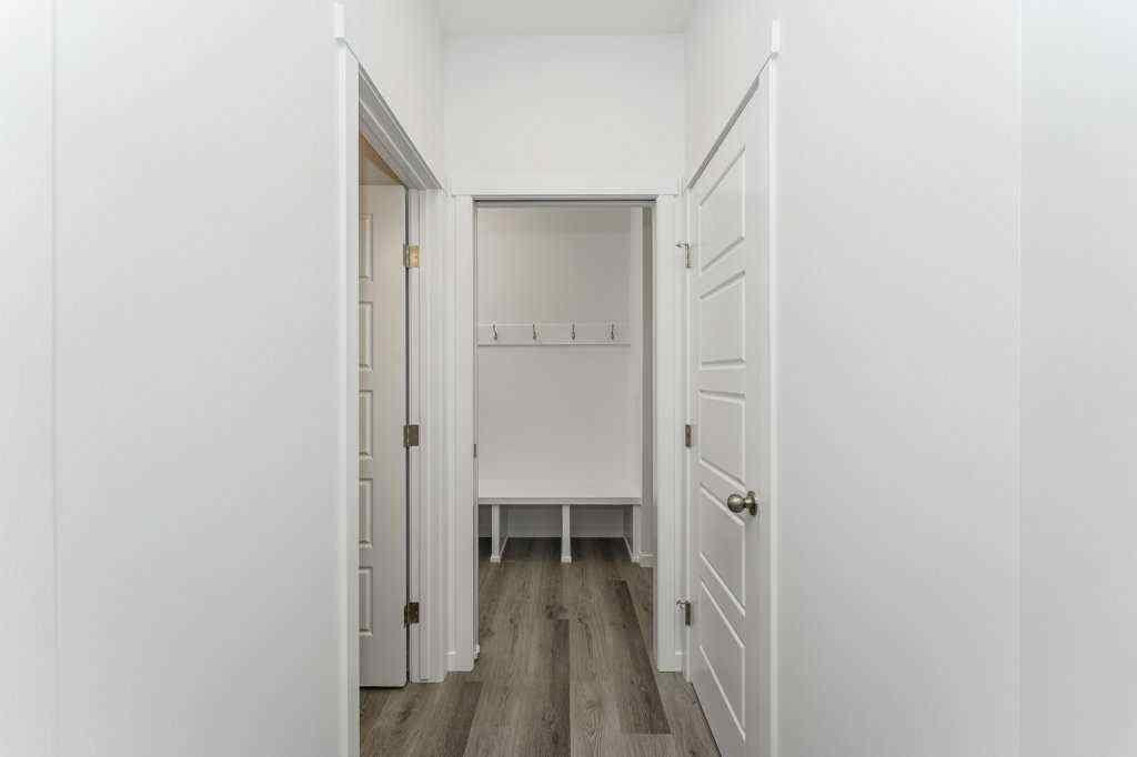 MLS® A2221582 - 68 Creekstone Grove SW in Pine Creek Calgary, Residential