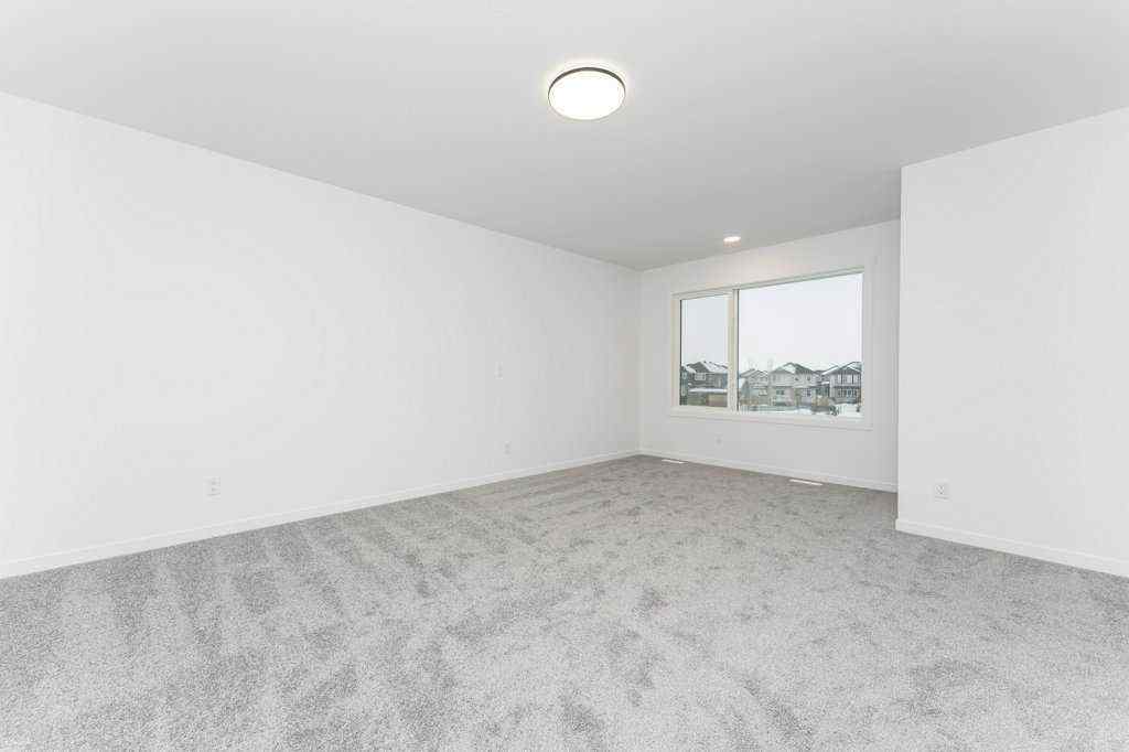 MLS® A2221582 - 68 Creekstone Grove SW in Pine Creek Calgary, Residential