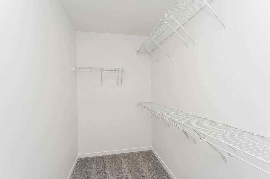 MLS® A2221582 - 68 Creekstone Grove SW in Pine Creek Calgary, Residential
