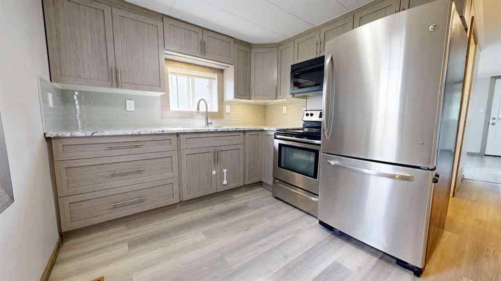 MLS® A2221625 - 10520 101 Avenue  in College Park Grande Prairie, Residential