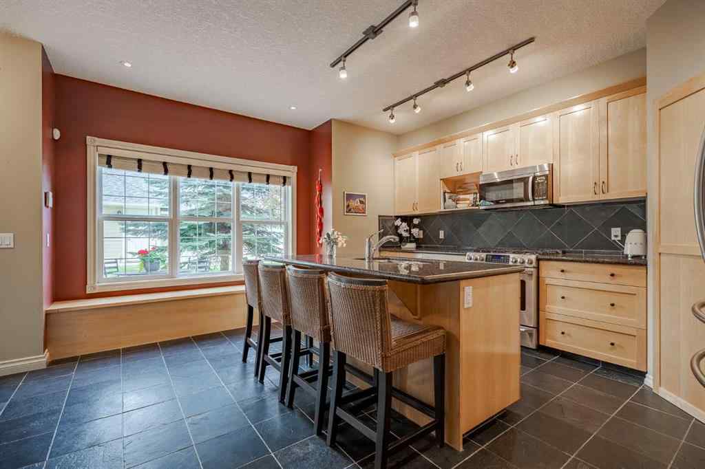 MLS® A2221793 - 211 Ypres Green SW in Garrison Woods Calgary, Residential