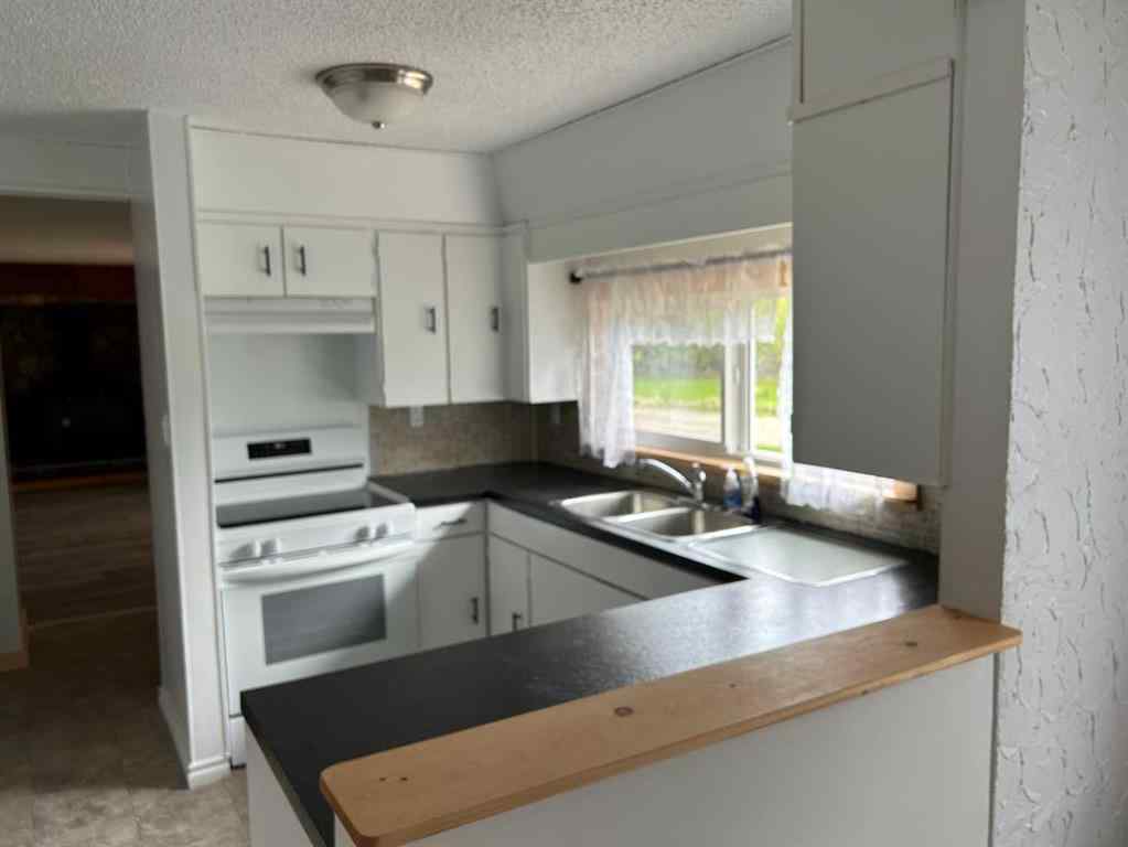 MLS® A2221825 - 54,52 1st Avenue  in NONE Faust, Residential