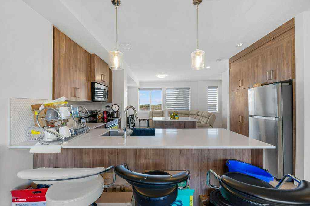 MLS® A2221936 - Unit #304 33 Merganser Drive W in Chelsea_CH Chestermere, Residential