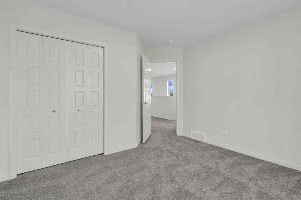 MLS® A2221944 - 83 Lucas Passage NW in Livingston Calgary, Residential