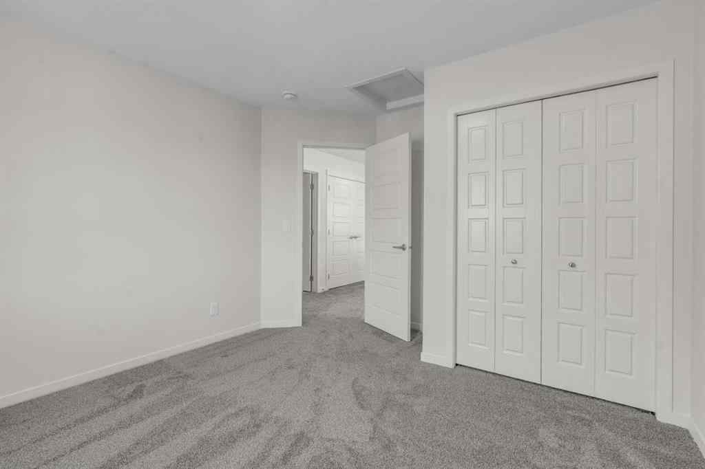 MLS® A2221944 - 83 Lucas Passage NW in Livingston Calgary, Residential