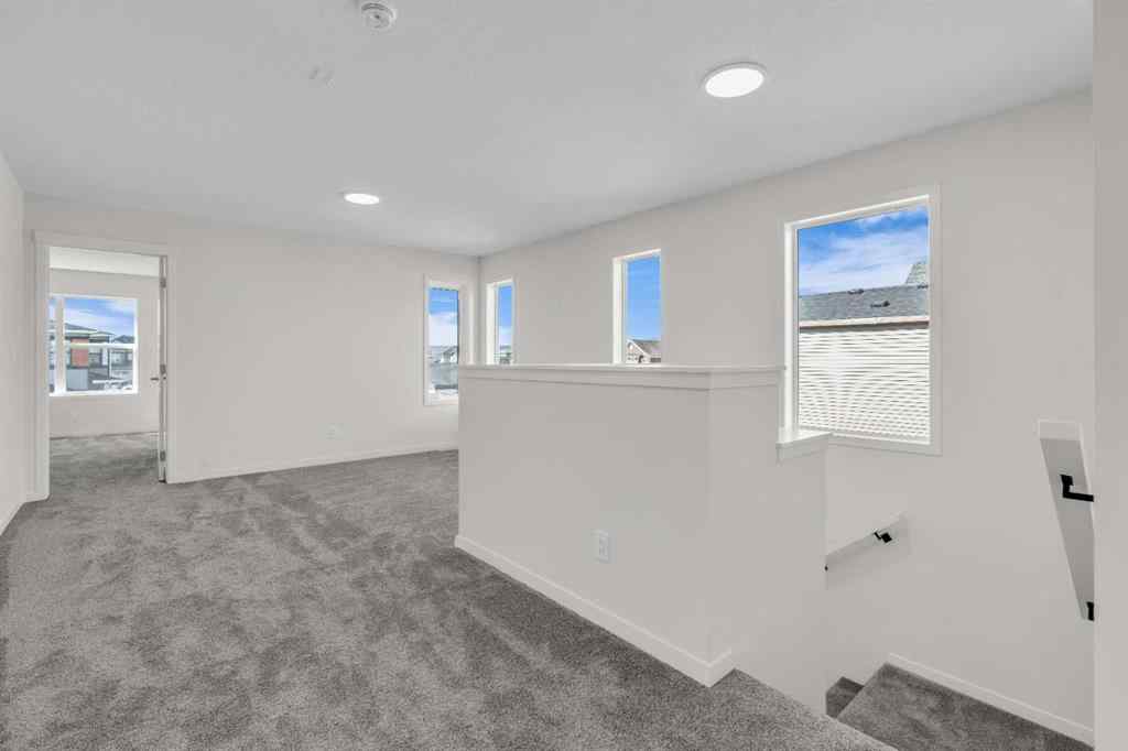 MLS® A2221944 - 83 Lucas Passage NW in Livingston Calgary, Residential