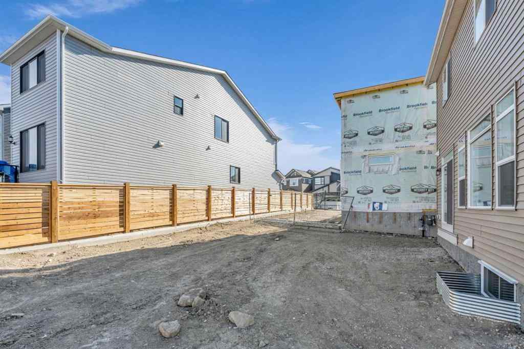 MLS® A2221944 - 83 Lucas Passage NW in Livingston Calgary, Residential