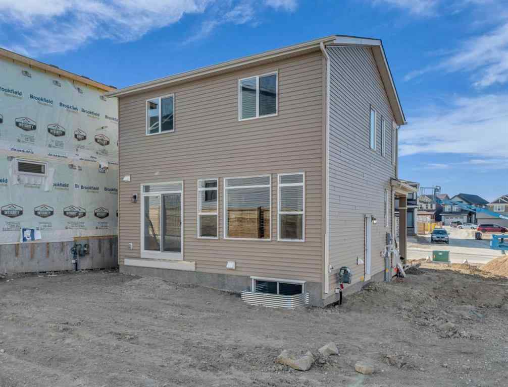 MLS® A2221944 - 83 Lucas Passage NW in Livingston Calgary, Residential