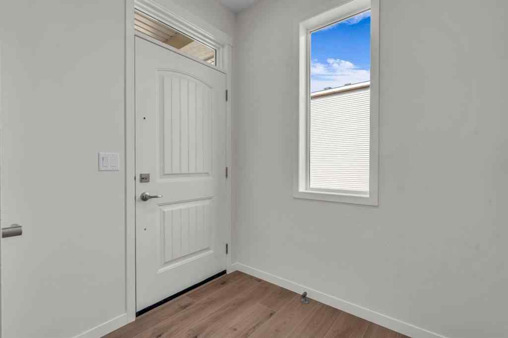 MLS® A2221944 - 83 Lucas Passage NW in Livingston Calgary, Residential