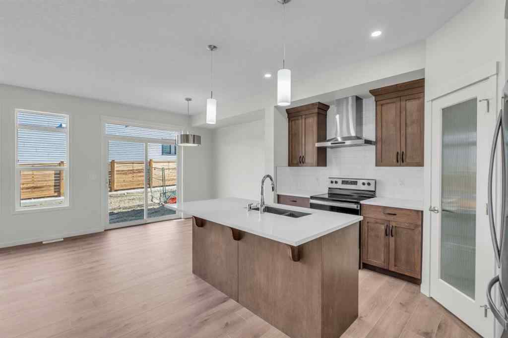 MLS® A2221944 - 83 Lucas Passage NW in Livingston Calgary, Residential