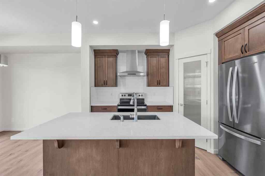 MLS® A2221944 - 83 Lucas Passage NW in Livingston Calgary, Residential