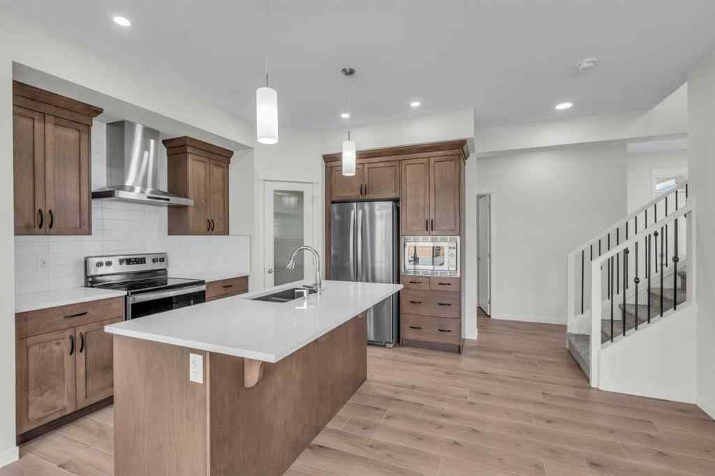 MLS® A2221944 - 83 Lucas Passage NW in Livingston Calgary, Residential