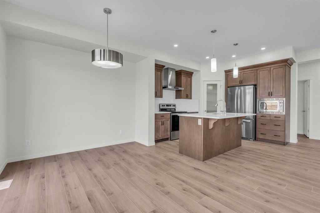 MLS® A2221944 - 83 Lucas Passage NW in Livingston Calgary, Residential