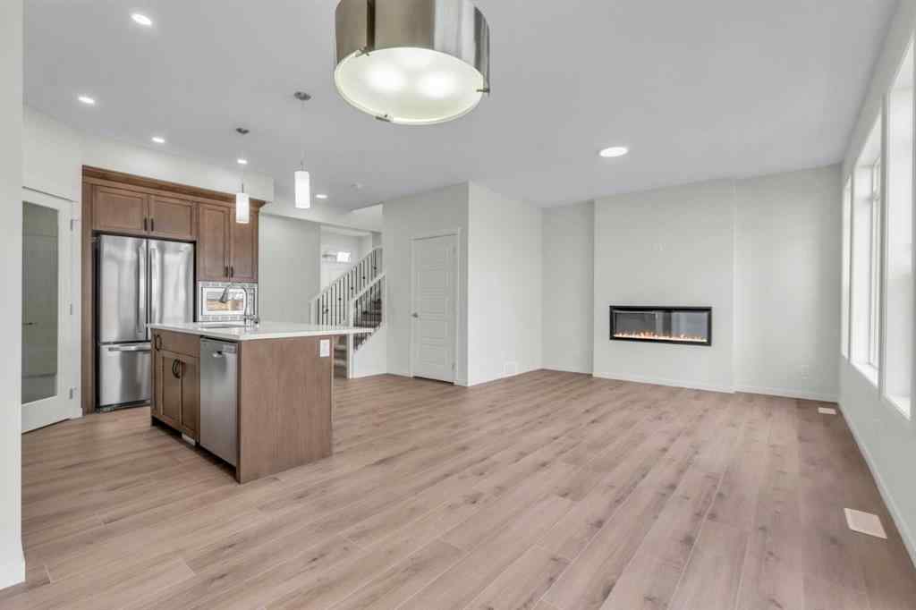 MLS® A2221944 - 83 Lucas Passage NW in Livingston Calgary, Residential