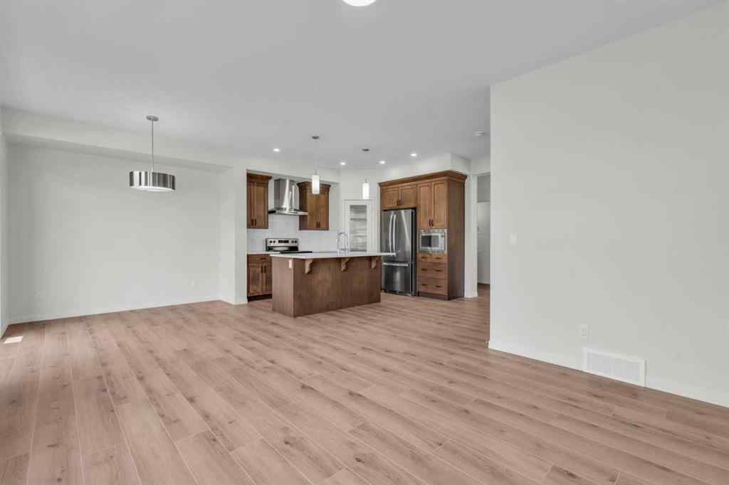 MLS® A2221944 - 83 Lucas Passage NW in Livingston Calgary, Residential