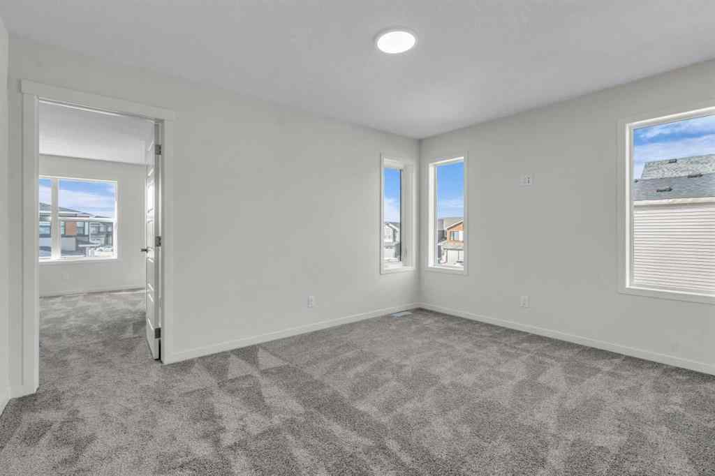 MLS® A2221944 - 83 Lucas Passage NW in Livingston Calgary, Residential