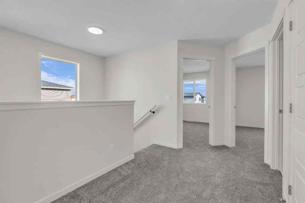 MLS® A2221944 - 83 Lucas Passage NW in Livingston Calgary, Residential