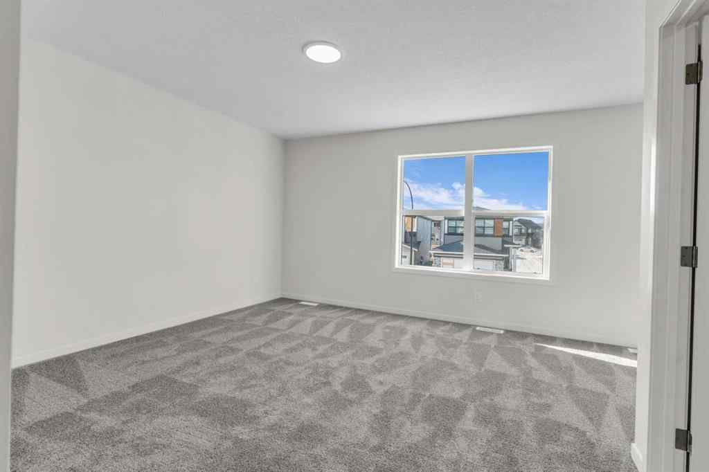 MLS® A2221944 - 83 Lucas Passage NW in Livingston Calgary, Residential