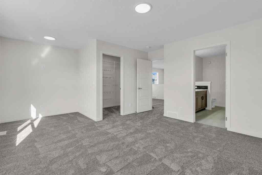 MLS® A2221944 - 83 Lucas Passage NW in Livingston Calgary, Residential