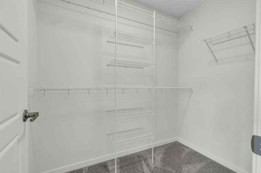 MLS® A2221944 - 83 Lucas Passage NW in Livingston Calgary, Residential