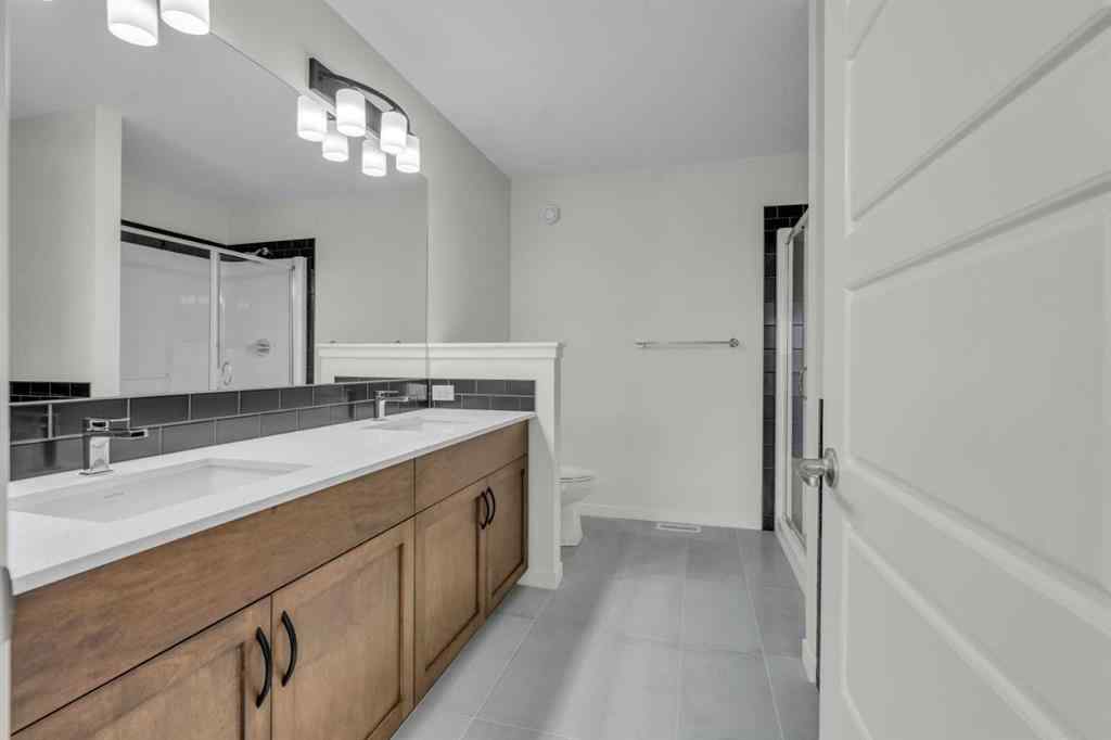 MLS® A2221944 - 83 Lucas Passage NW in Livingston Calgary, Residential