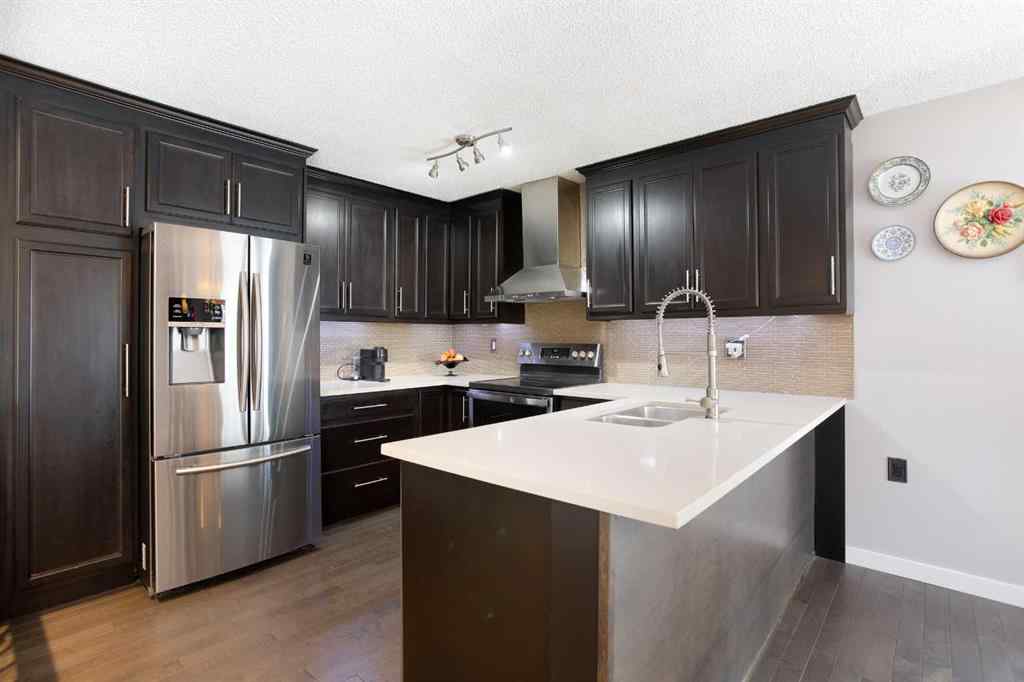 MLS® A2222003 - 56 Strathclair Place SW in Strathcona Park Calgary, Residential